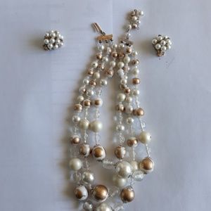 Vintage gold and white pearls with earrings.